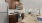 a kitchen with wooden cabinets