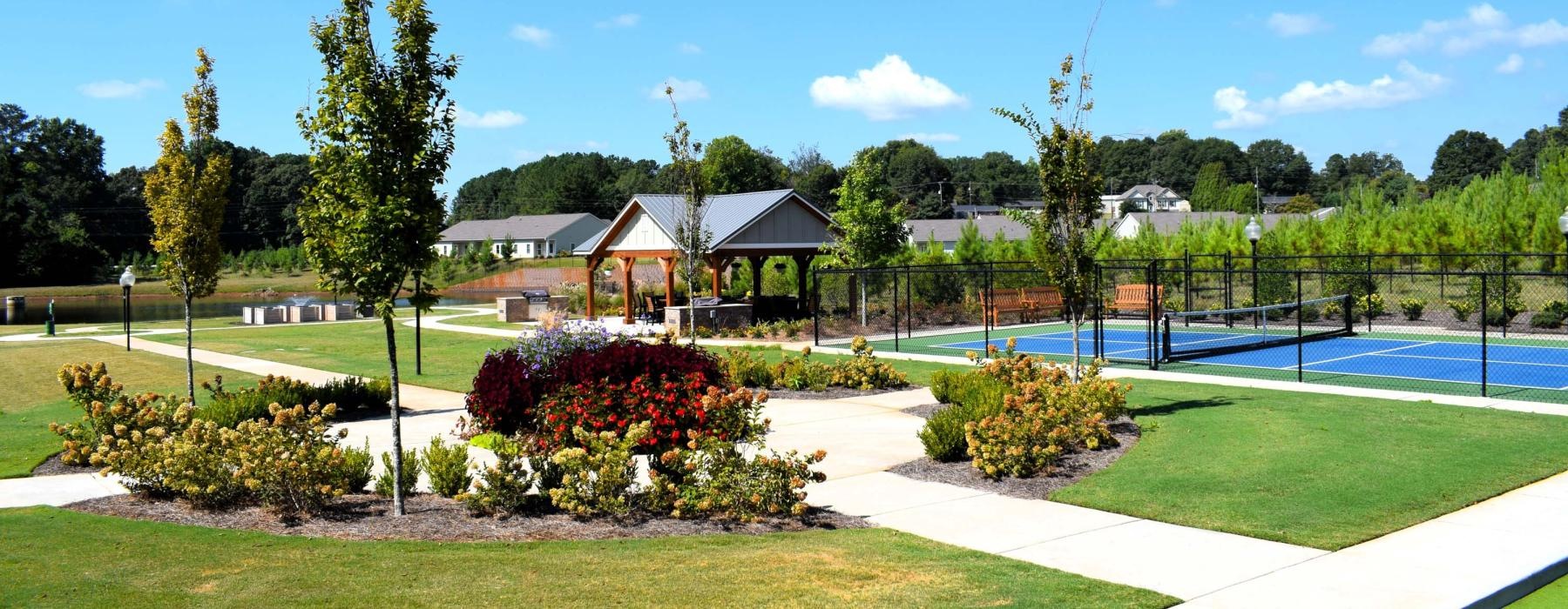a beautiful garden in front of a house