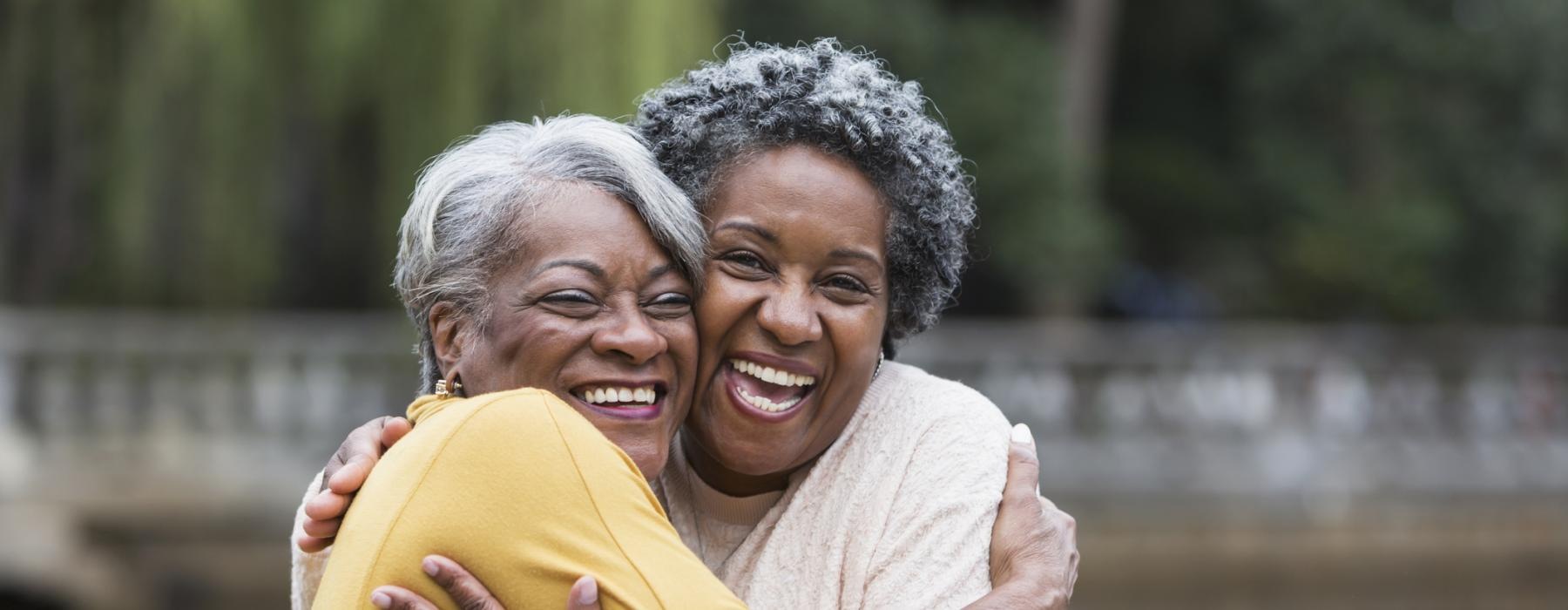 two woman hugging
