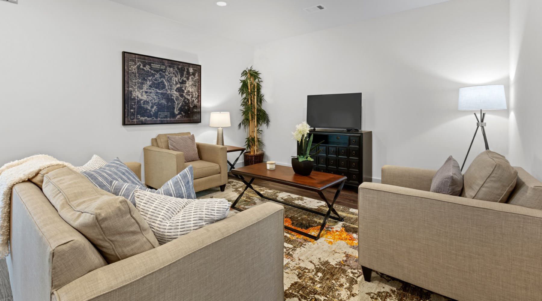 Find your perfect fit at Hardy Springs a living room with a couch and a coffee table